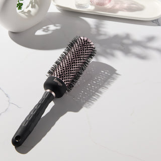Round brush on vanity. 