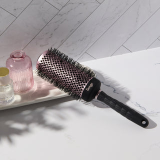 Round brush on vanity. 