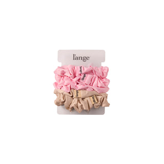 L’ange medium satin scrunchies 5-piece set in blush pink and champagne, stacked on a card against a white background.