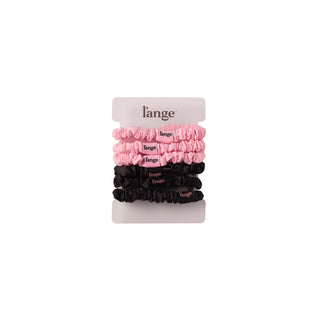 L’ange small satin scrunchies 6-piece set in blush pink and black, stacked on a card against a white background.