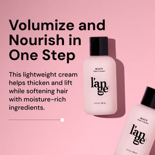 A light pink bottle of L’ange Selecte Thick It Cream lies angled on a matching pink background with a shadow. Bold text to the left reads: 'Volumize and Nourish in One Step.' Below, supporting text says: 'This lightweight cream helps thicken and lift while softening hair with moisture-rich ingredients.' The bottle is labeled 4 fl oz (118 ml).