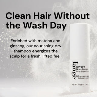 "Clean Hair Without the Wash Day" text beside Sky Lift Non-Aerosol Dry Shampoo bottle with powder texture background. Text follows "Enriched with matcha and ginseng, our nourishing dry shampoo energizes the scalp for a fresh, lifted feel"
