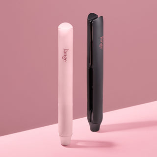 Blush and Black flat irons on a pink background