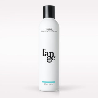 L’ange Tonique Invigorating Mint Shampoo on a blank background 