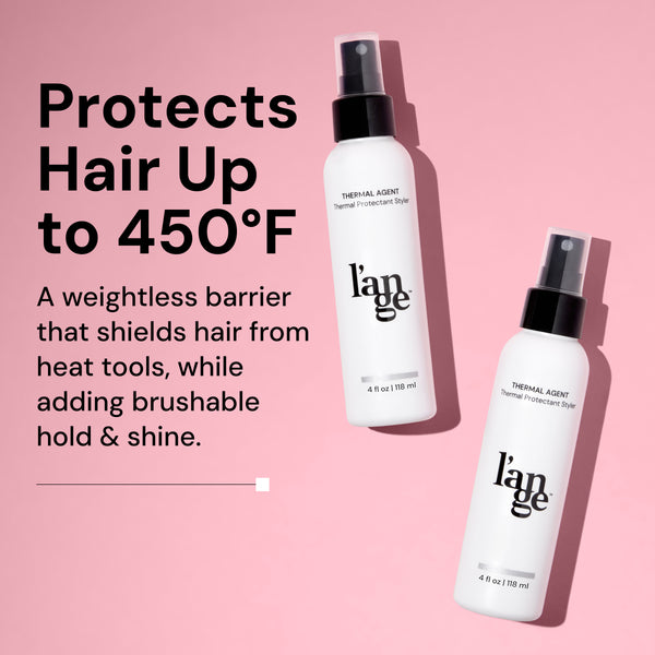 Thermal protectant styling spray, shields hair from heat up to 450°F, adds brushable hold and shine; 4 fl oz (118 ml) bottles on a pink background.