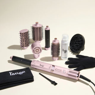 Fresh Blowout Trio Value Set, featuring a Blush TurboStyle dryer with attachments, a diffuser, a heat glove, and Glass Hair, displayed on a beige background