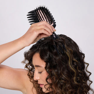 model using the TriWave brush at the roots of curly hair