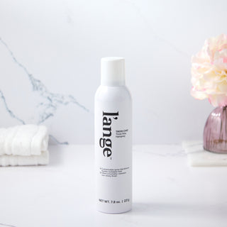 L’ange Trois Chic hairspray on marble counter