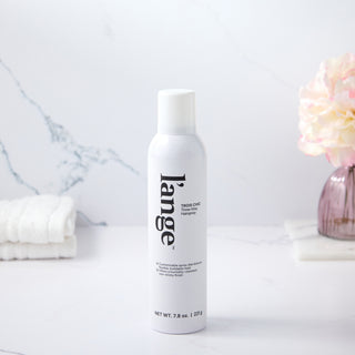 L’ange Trois Chic hairspray on marble counter