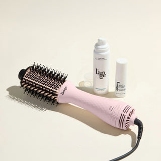 The Fresh Blowout Trio Value Set featuring a Blush 60mm Le Volume,  Glass Hair, and Sky Lift, displayed on a beige background.