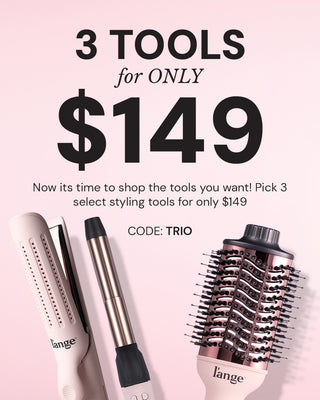 Promotion for a set of three styling tools for $149, featuring a styling iron, curling wand, and blow dryer brush, with the code "TRIO".