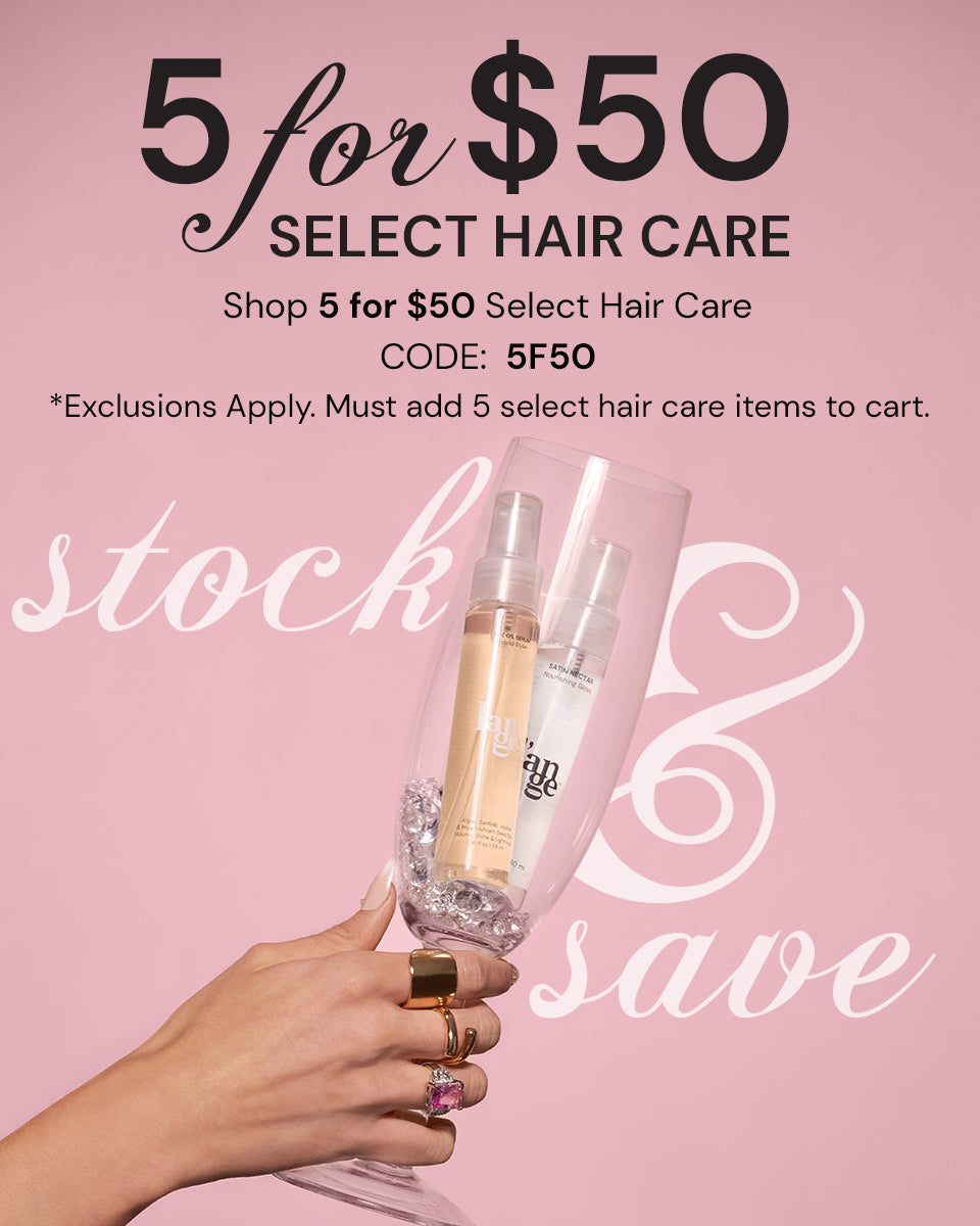 Promotional offer for "5 for $50 Select Hair Care" with the code 5F50, featuring two hair care products in a glass held by a hand with stylish rings against a pink background.