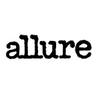 A stylish, black cursive word "Vogue" on a white background.