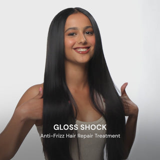 Education video. Text reads "GLOSS SHOCK. Anti-Frizz Hair Repair Treatment" "Transform dull, damaged strands with our repairing treatment that delivers glossy shine and frizz-free smoothness"