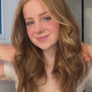 Women using Rival Heat Shield on their hair and then using a Heat Styling Tool