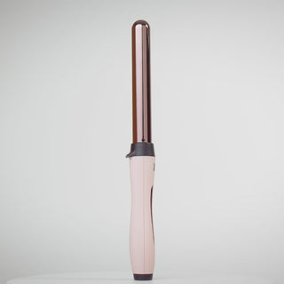 Zoomed in video of Blush clip free 25mm titanium barrel with soft touch ergonomic handle & rose gold power button