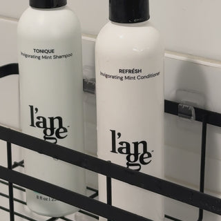 Women washing hair with Refrésh Shampoo 