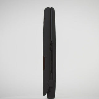 Zoomed in video of Black flat iron with ceramic, rounded edges plates and soft-touch handle and digital LCD Display