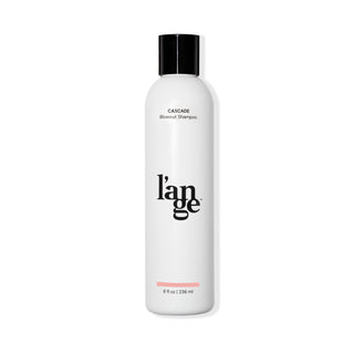 White 8 oz bottle with black font Cascade Blowout Shampoo, black L’ange logo & black cover