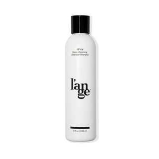 White 8oz bottle with Detox Deep-Cleansing Charcoal Shampoo black font and L’ange logo & black cap