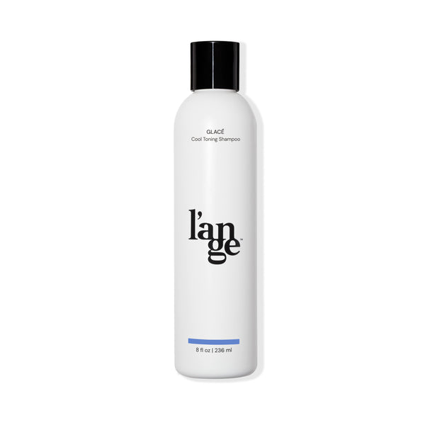 White 8fl oz bottle with Glace Cool Toning Shampoo and L’ange logo in black font with black tap