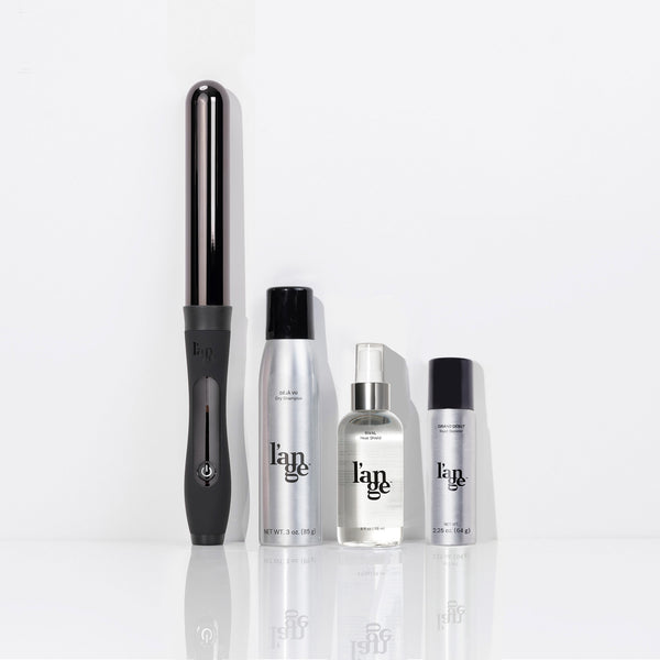 Black 32mm titanium curling wanted & two silver bottles of Grand Debut root booster & Haute To Trot