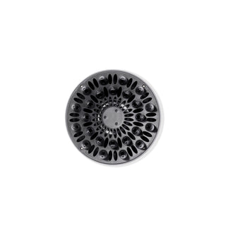 The vented side of the black Doux diffuser for Soleil is facing you so you can see the prongs.