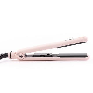 Side angle of blush flat iron with black ceramic rounded plate & soft-touch rubber handle